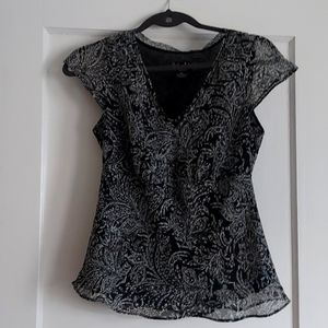 A black and white Rafaella top